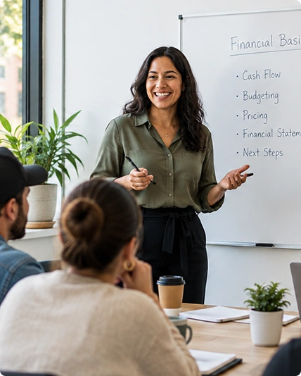 Instructor leading a financial basics workshop for small business owners